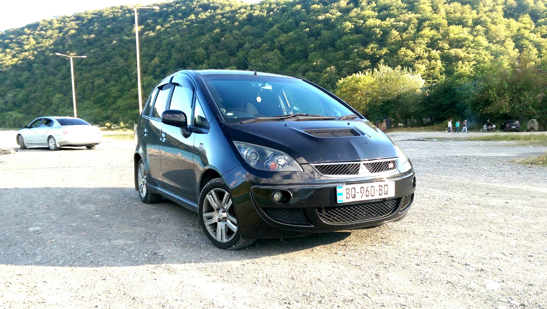 Mmc colt. Mitsubishi Colt 2006. Mitsubishi Colt Plus. Митсубиси Кольт ралли арт. Мицубиси Кольт 2006.