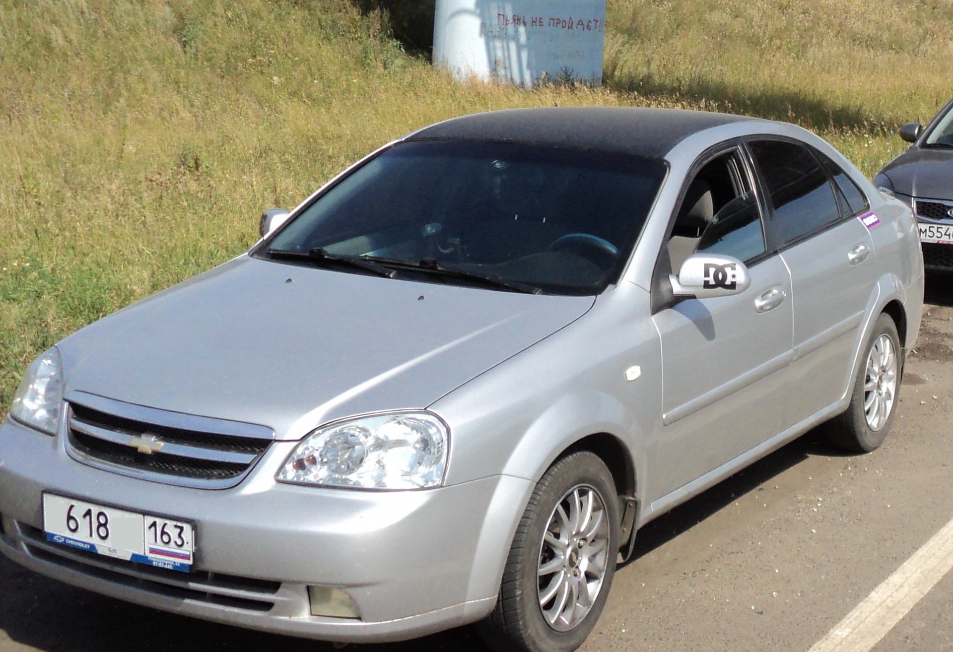 Chevrolet Lacetti красный с черной крышей