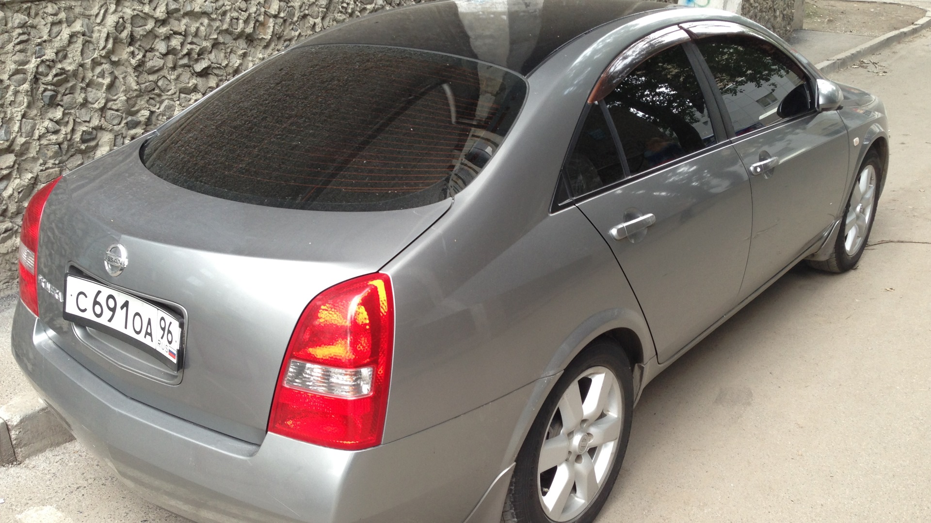 nissan primera 2005 зад