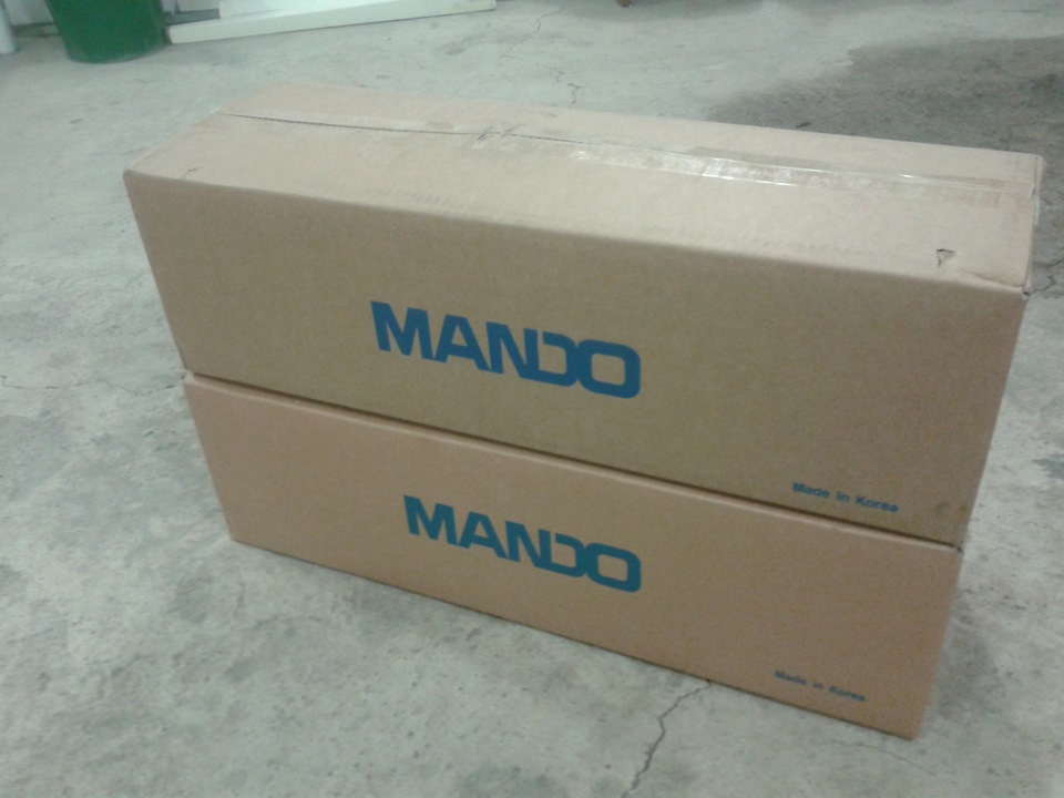 Стойки мандо отзывы. Задние стойки Мандо на Церато 2 на драйв 2. Стойки на Киа Маджентис 2 второе поколение 2006 года фирма Мандо. Передние стойки для Церато 2 корейского производителя Мандо на драйв 2. Фото коробка амортизатора Мандо +.