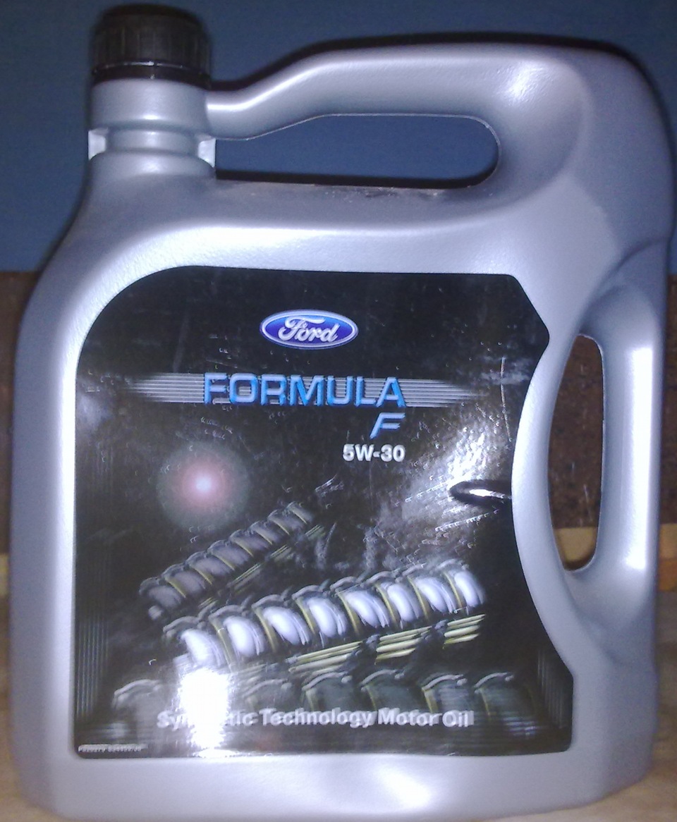 Масло форд фокус с пробегом. Форд фокус 2 масло оригинал оригинал. Масло в двигатель Форд фокус 2 1.8. Ford Focus 2 моторное масло. Масло в двигатель Форд фокус 2 2007 года.