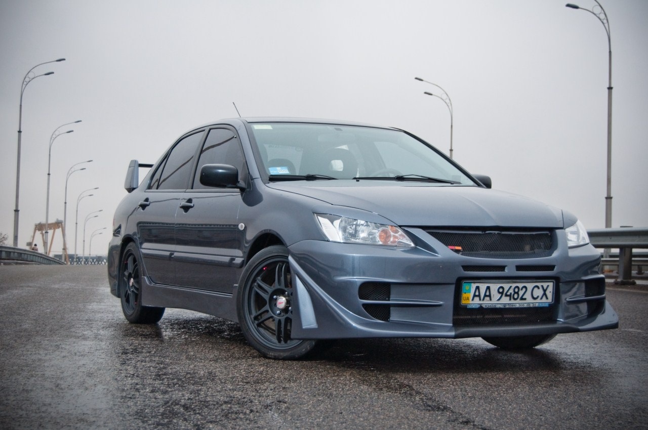 Лансер стиль. Lancer 9 EVO Style. Lancer 9 1.6 обвес Ralliart. Mitsubishi Lancer 2006. Митсубиси Лансер 9 Рестайлинг в обвесах.