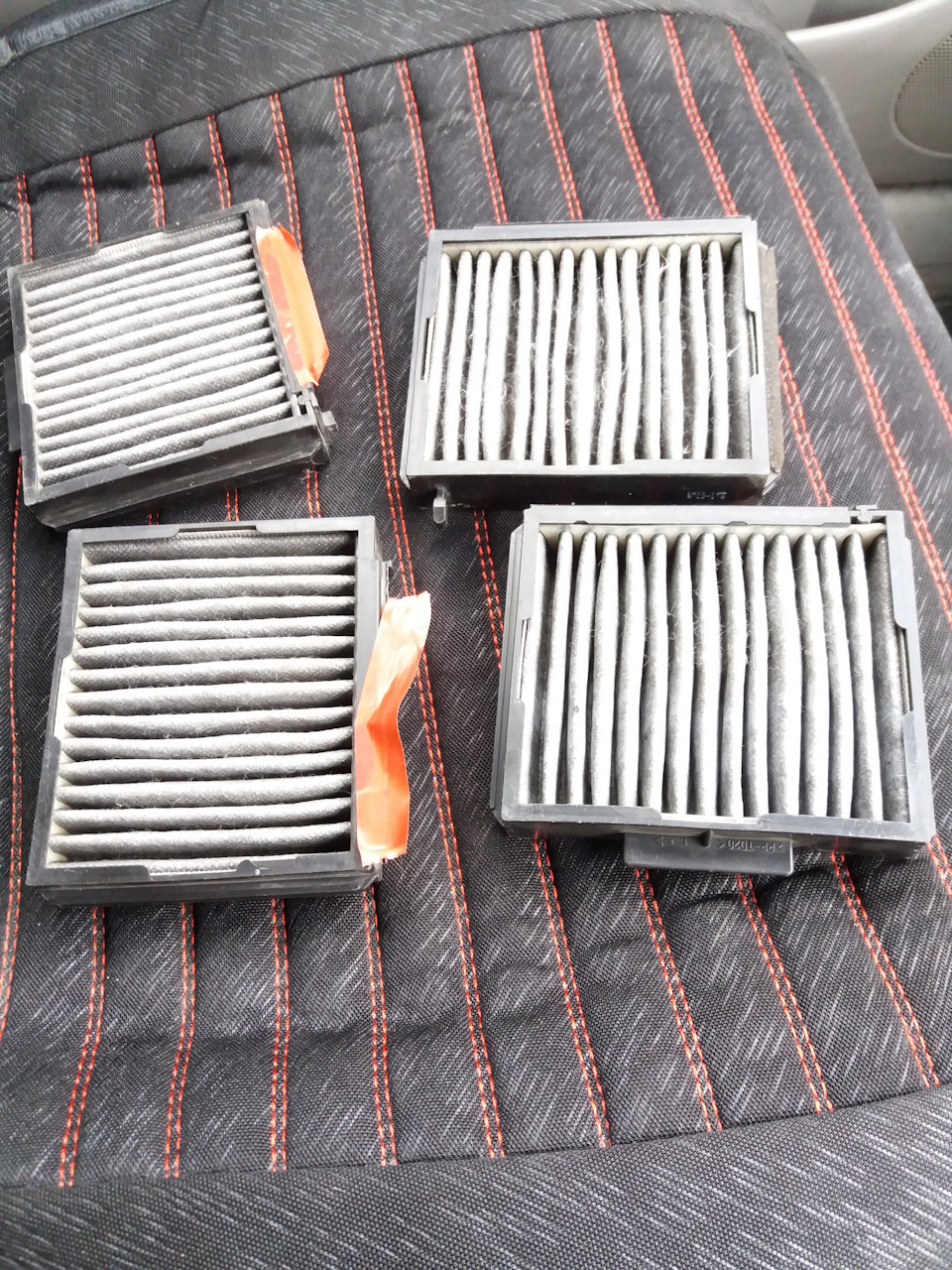 4 фильтра от не знаю чего, тупо соединенные изолентой — Mazda Premacy (1G)