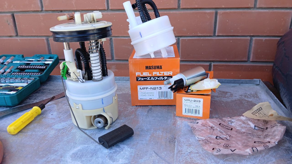 . — Nissan Tiida (1G). Запчасти на фото: MFFN213, MPU203