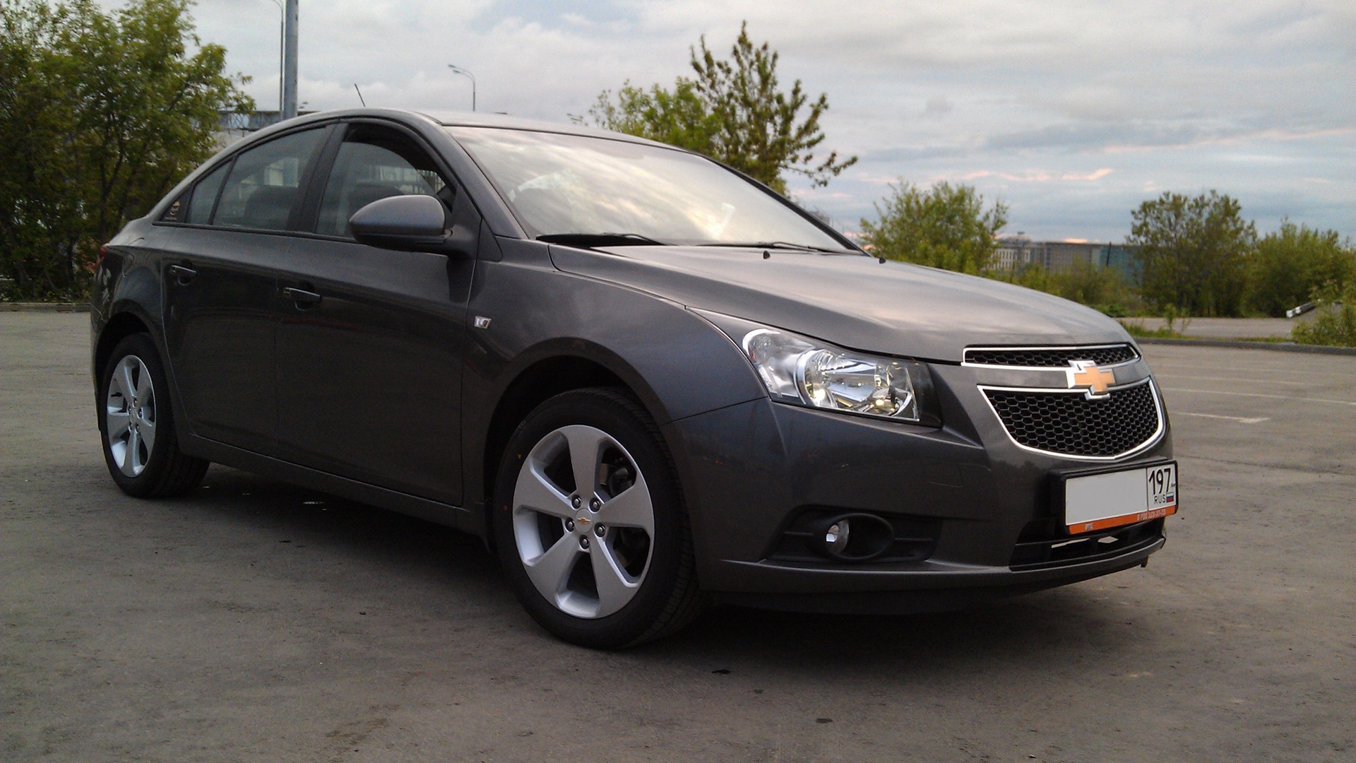 Отзывы о шевроле круз. Шевроле Круз 2011 года. Chevrolet Cruze 2011 1.6 механика. Шевроле Круз 2011 мокрый асфальт. Шевроле Круз 46 регион.