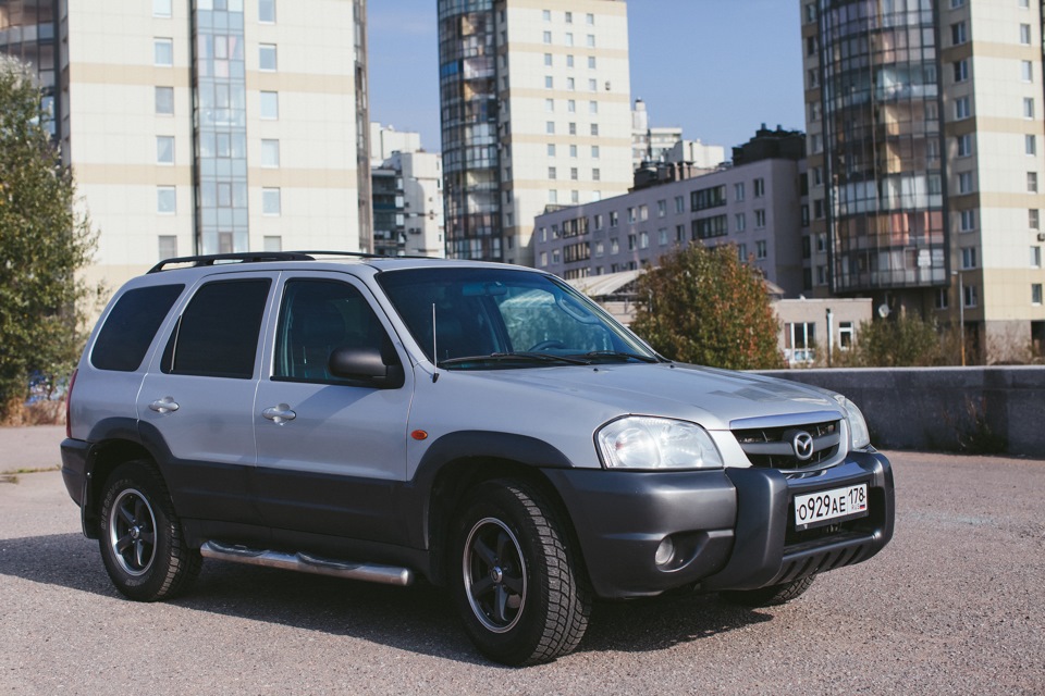 Мазда трибьют 3л. Mazda Tribute 3.0 at. Мазда паркетник 2003 года. Мазда трибьют 2003 фото. Мазда трибьют 1 поколения фото с черными дисками.