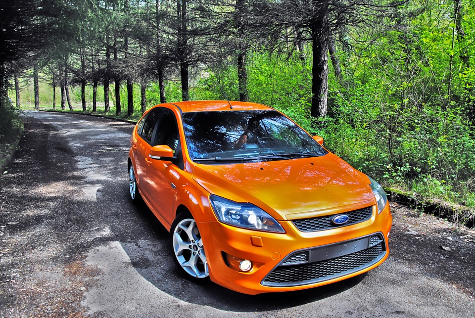 2 оранжевых. Ford Focus St 2008 оранжевый.