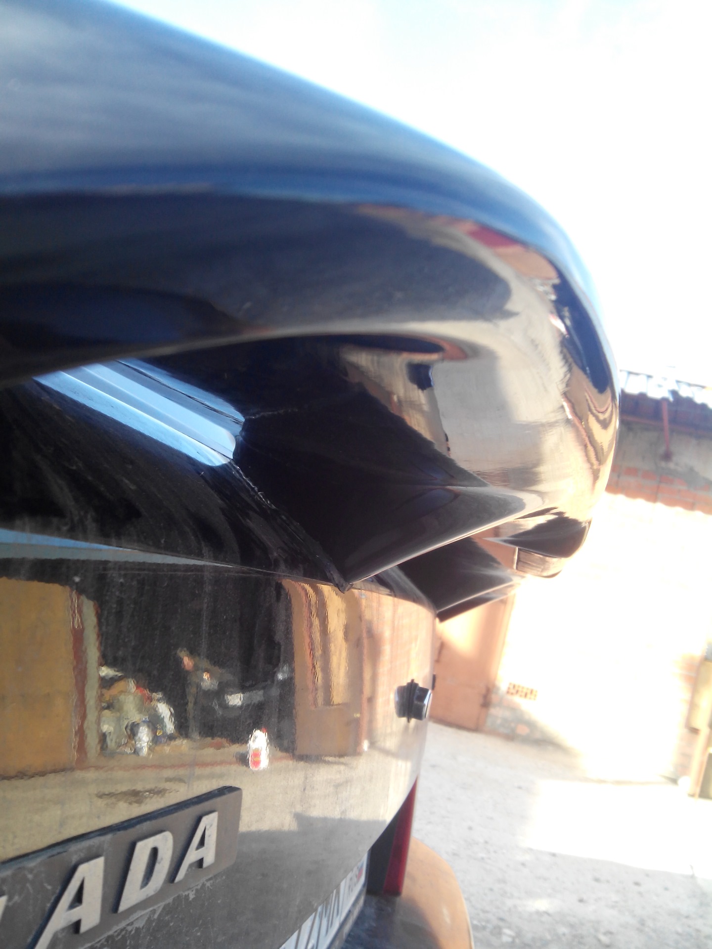 замена спойлера