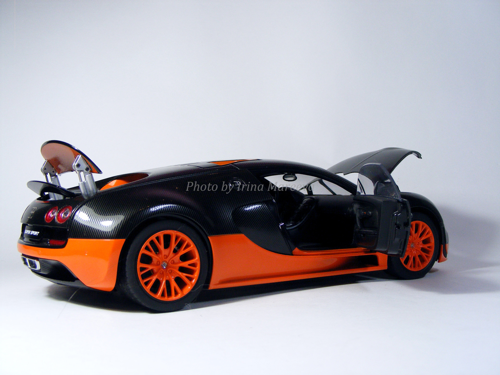 Super sport купить. AUTOART Bugatti Veyron. Bugatti Veyron Black AUTOART. Veyron super Sport Black Carbon. С фоном Бугатти на пульте управления.