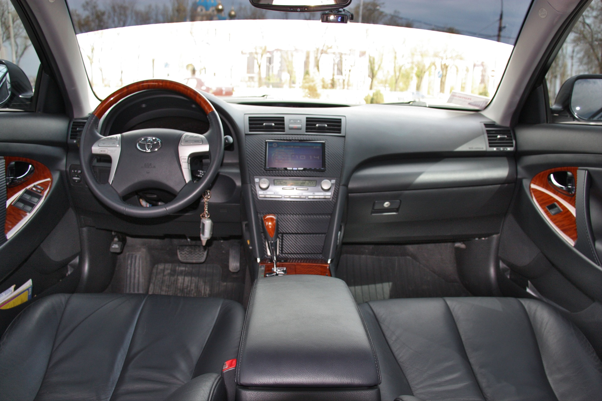 Photo of the interior or got rid of the turquoise insert on the center console - Toyota Camry 35 L 2008