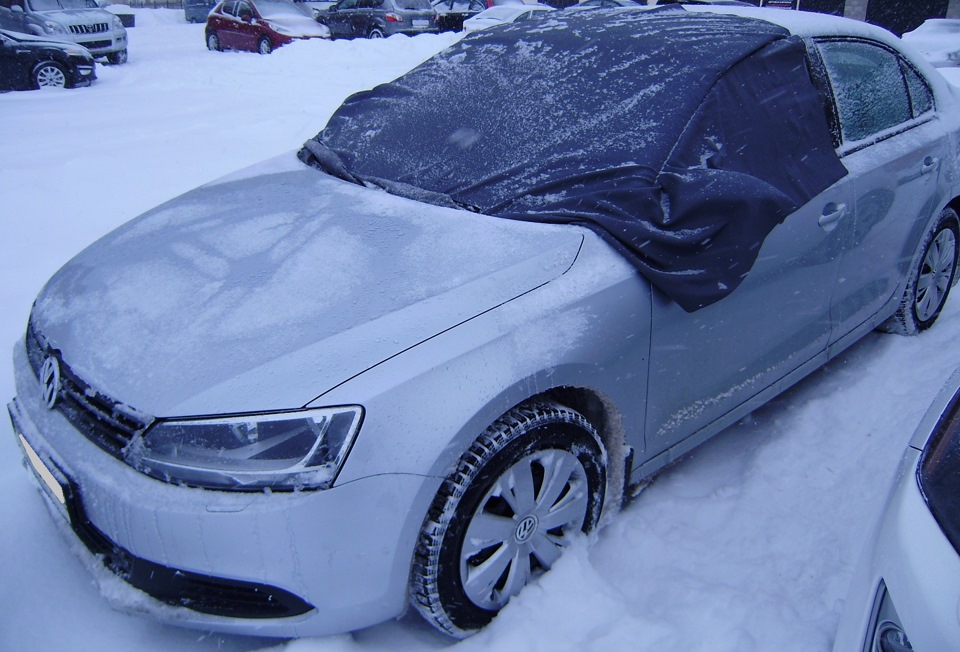 Как отогреть стекла в автомобиле зимой ?