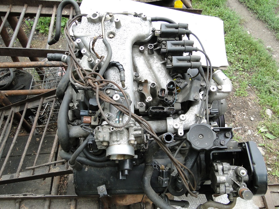 Замена двигателя mitsubishi. Двигатель Митсубиси 4d34. ДВС Мицубиси 484. Мотор Mitsubishi Delica 3,0. Двигатель Митсубиси 3.0 битурбо.