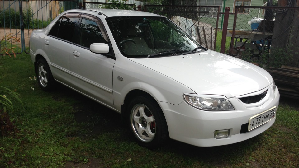 Мазда фамилия. Mazda familia 2001 1.5. Мазда фамилия 2002 1.5. Mazda familia 5 поколения. Mazda familia 2002 3 двери.