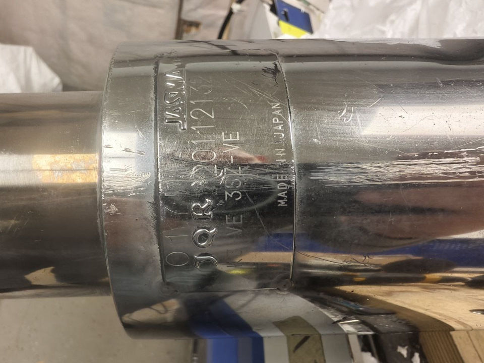 прям бирочка Jasma с номером и наименованием моторов — Toyota bB (2G)