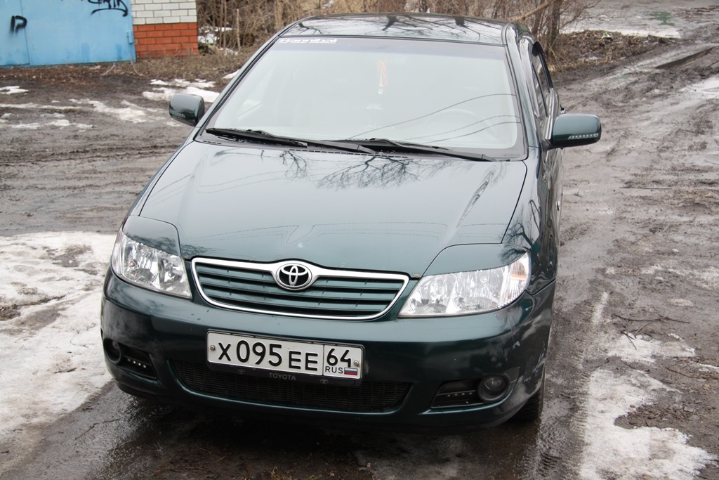 Фары королла е120. Реснички Toyota Corolla 120. Toyota Corolla 120. Тойота Королла 120 с противотуманками. Тойота Королла европейка 120 кузов.