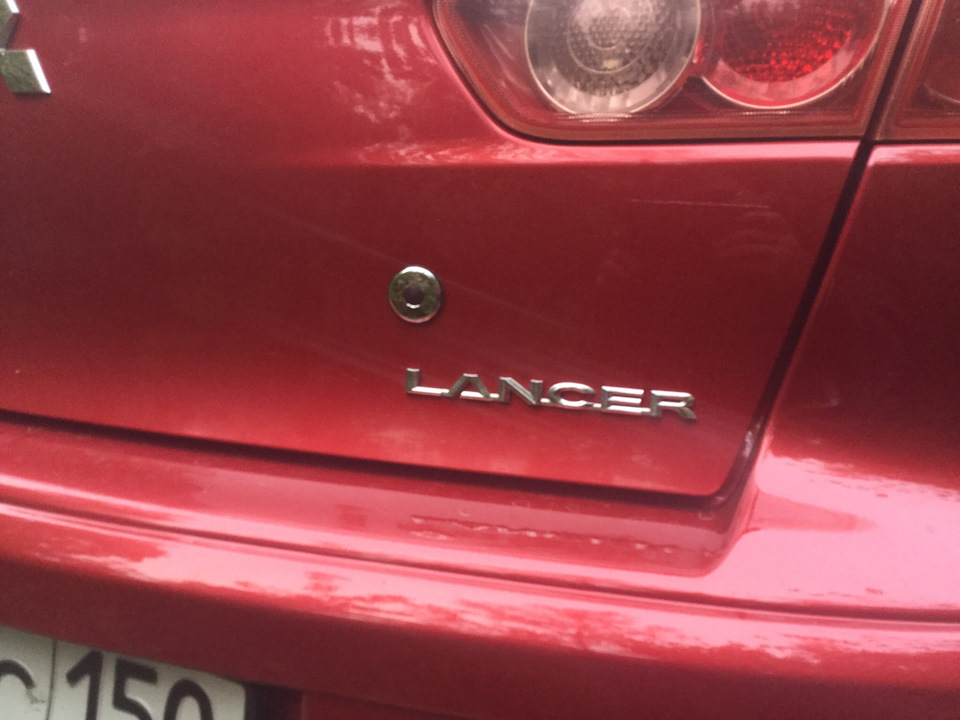 кнопка багажника mitsubishi lancer 10