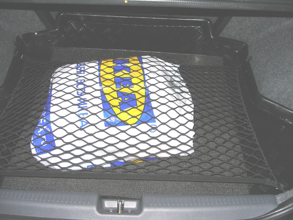 61e5278s 960 Как крепить сетку в багажнике