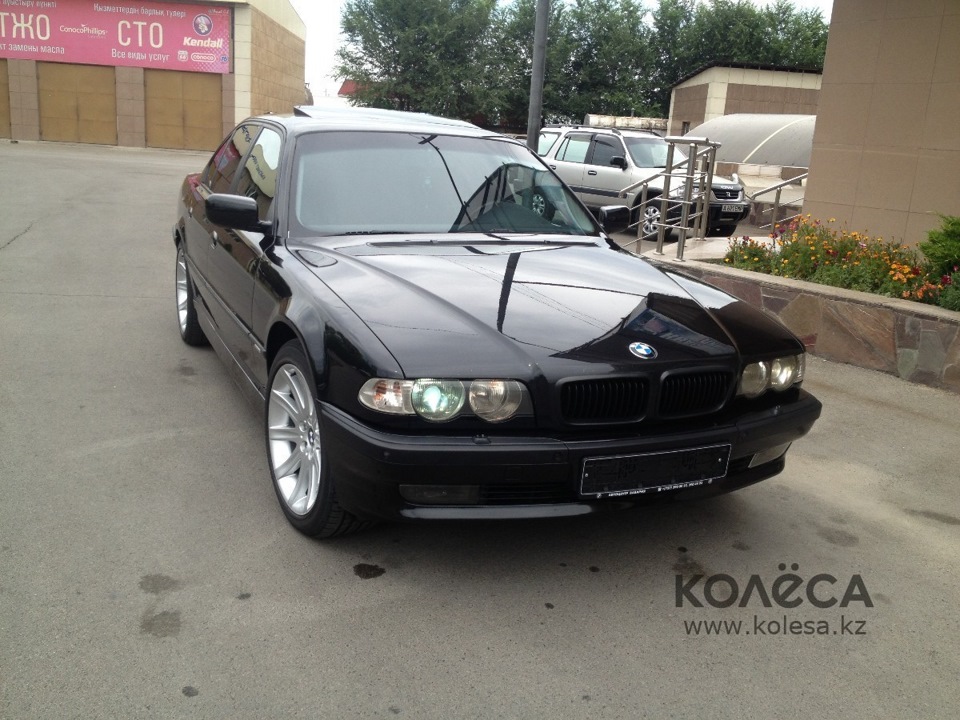 Бмв е65 735i