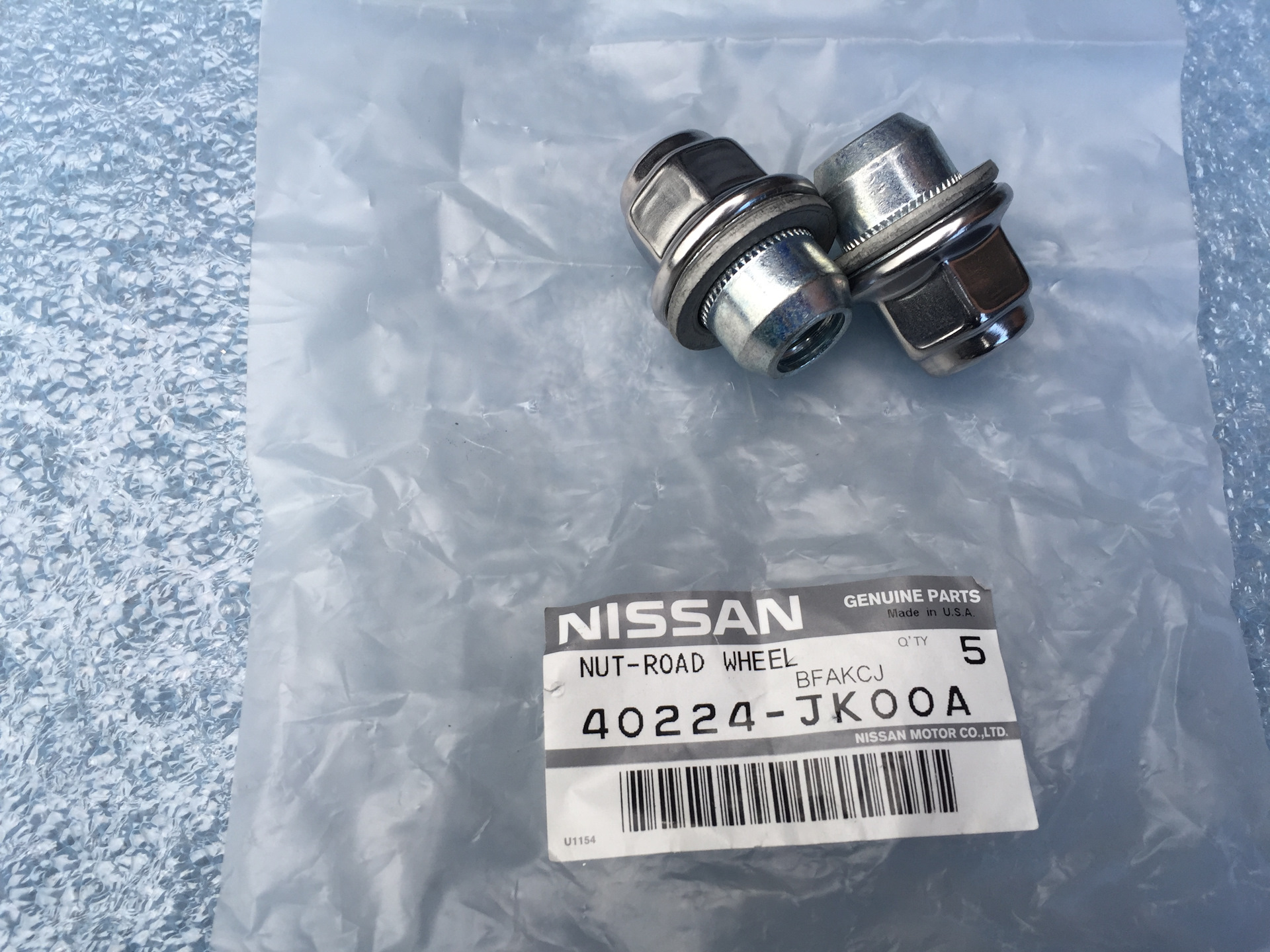 Ru000a108777. Nissan 40224jk00a гайка колесная. Nissan 40224-1la3a. Nissan 4022432j00 гайка колеса y61. 40224jk00a.