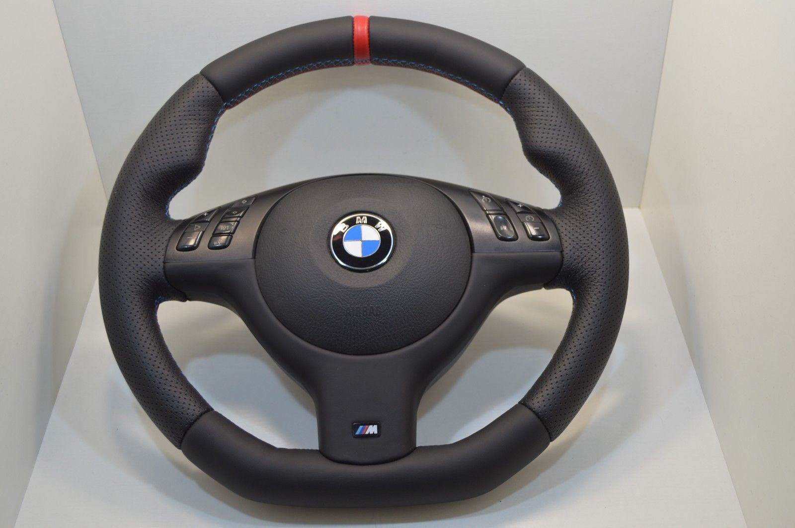 Перетяжка руля кожей bmw