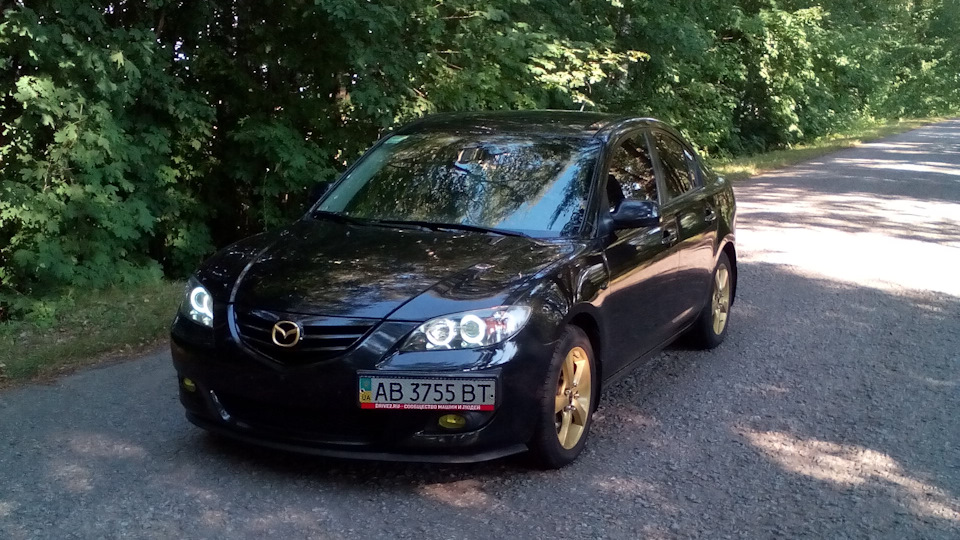 mazda 3 2006 золото