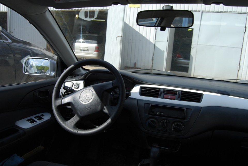 Перетяжка винилом элементов салона Lancer IX — DRIVE2