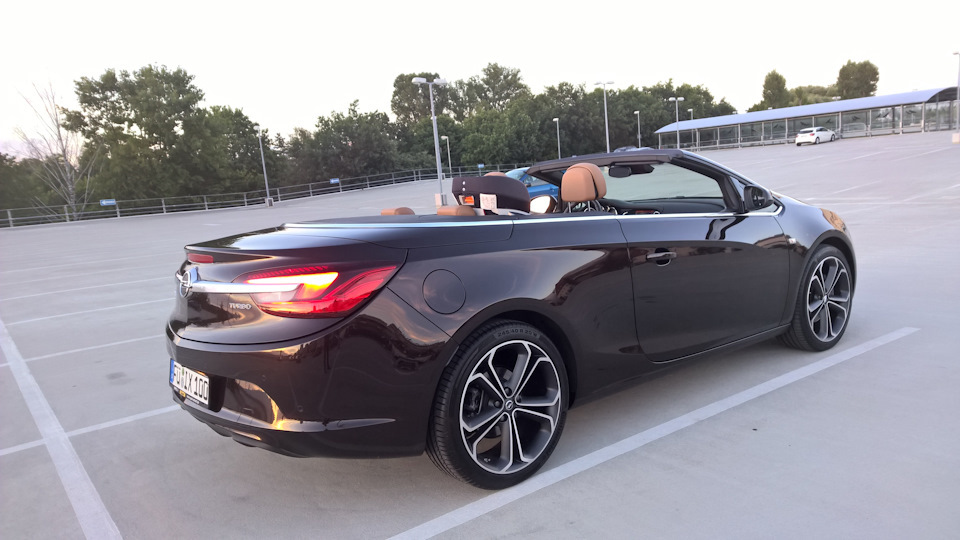 Шины opel cascada. Opel Cascada - Dark Mahagony. Opel Cascada аренда.