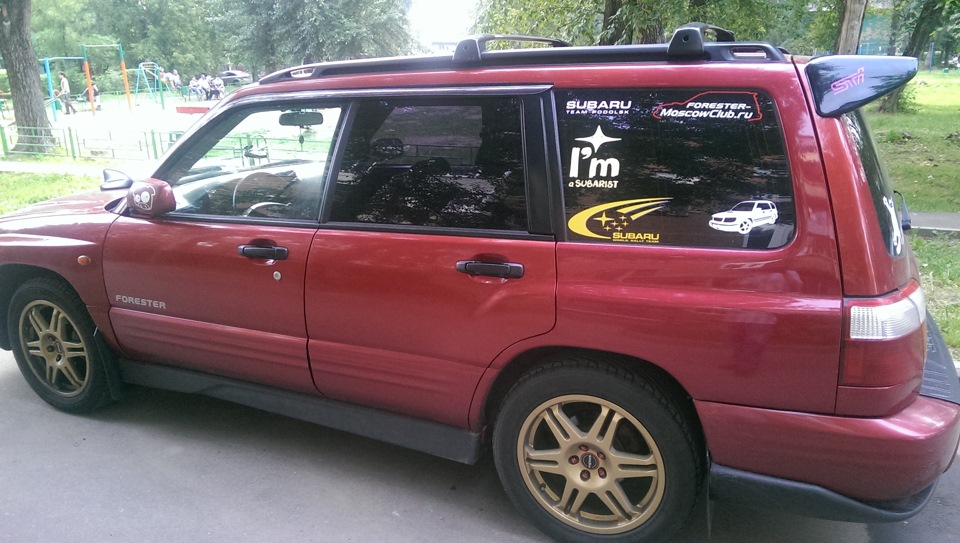 … — Subaru Forester (SF)