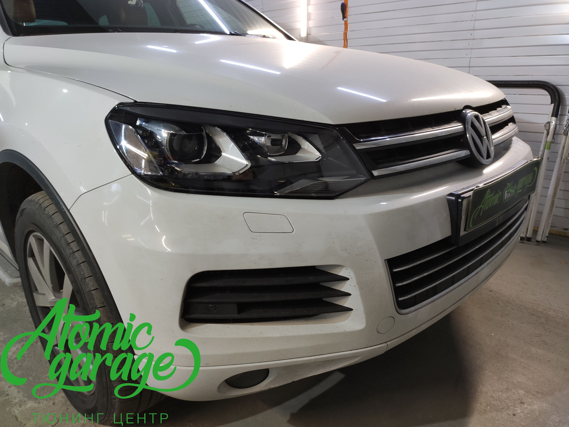 Фары touareg nf. Фара vw touareg nf. touareg nf покраска фар. туарег nf фары мерцание. фара touareg nf optlc.