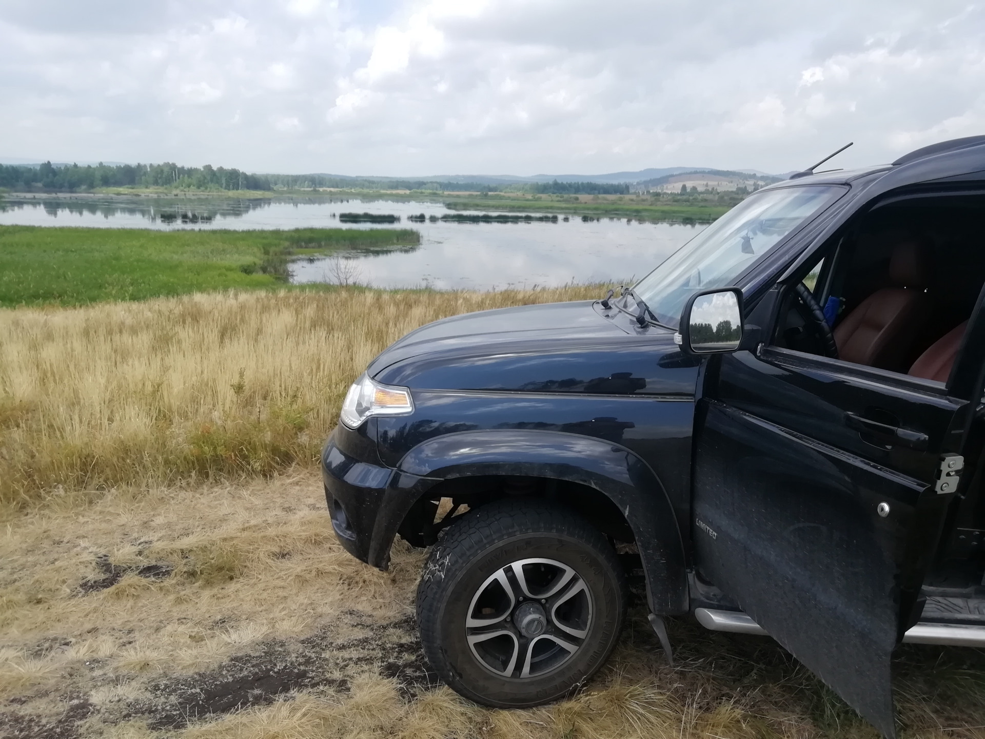 уаз патриот провисла водительская дверь