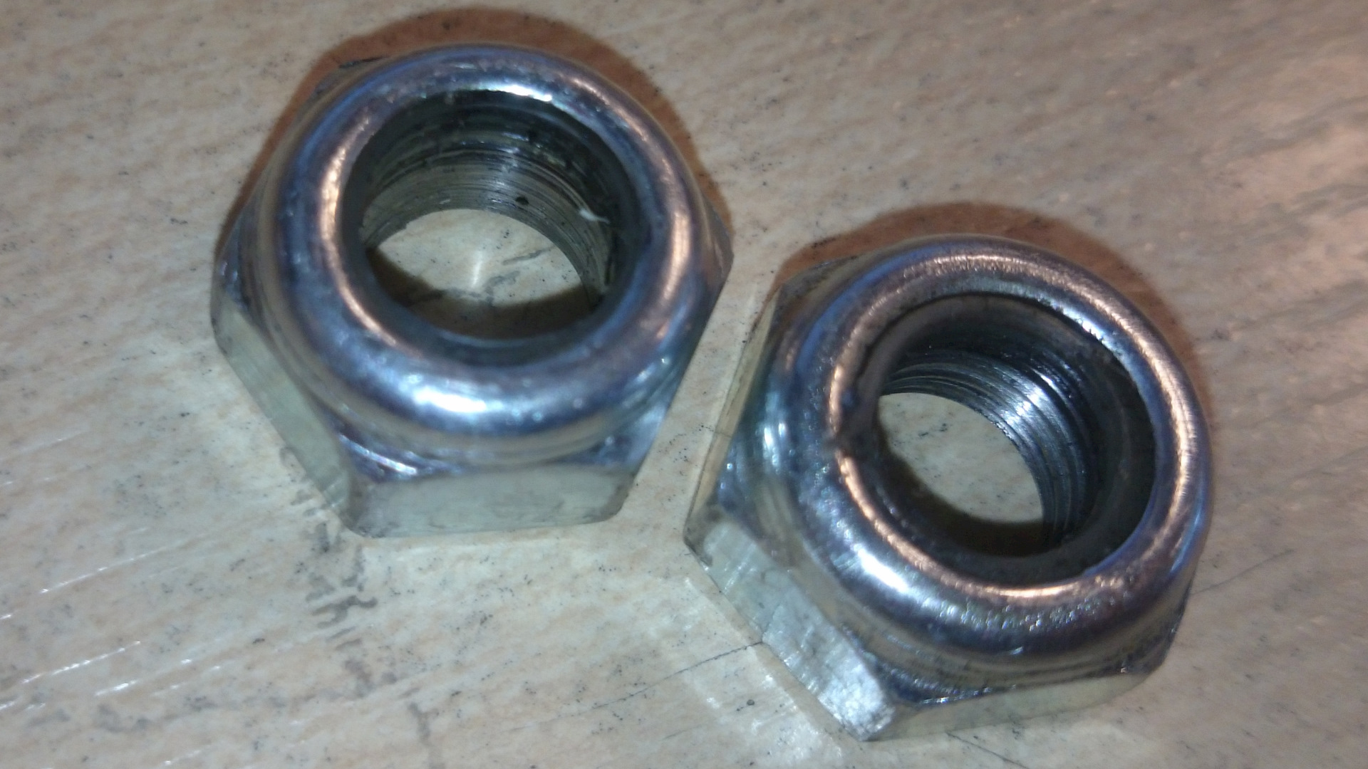 гайка корончатая мтз 1221. гайка рулевого наконечника ваз 2101. гайки рулевых наконечников. гайка рулевой тяги м14х1. 5.