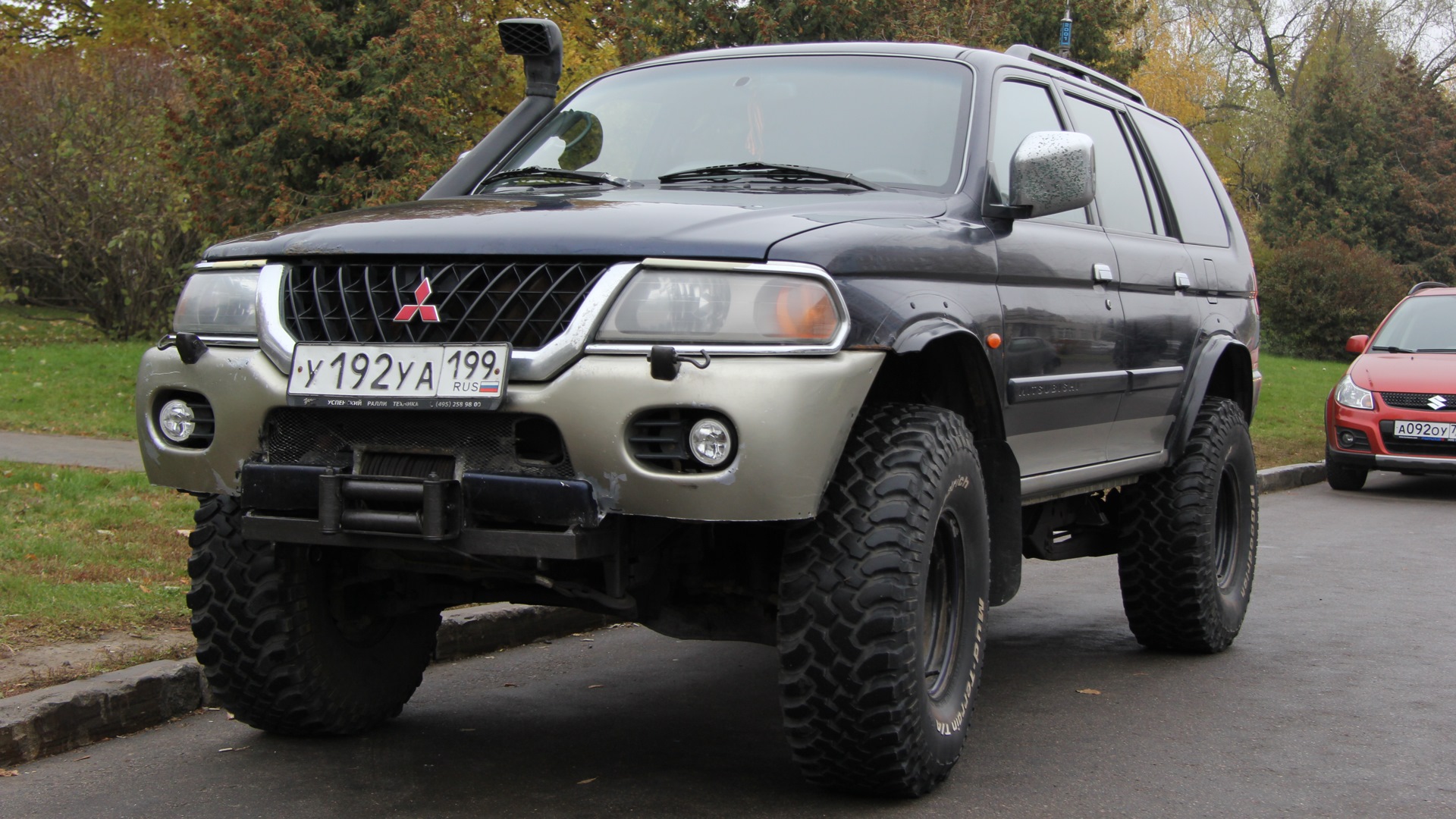 Митсубиси спорт 1. Паджеро спорт 3 2002. Mitsubishi Pajero Sport 1 на 35. Митсубиси Паджеро спорт 1 поколения 33 на 33 колесах. Pajero Sport 1 на 33 колесах.