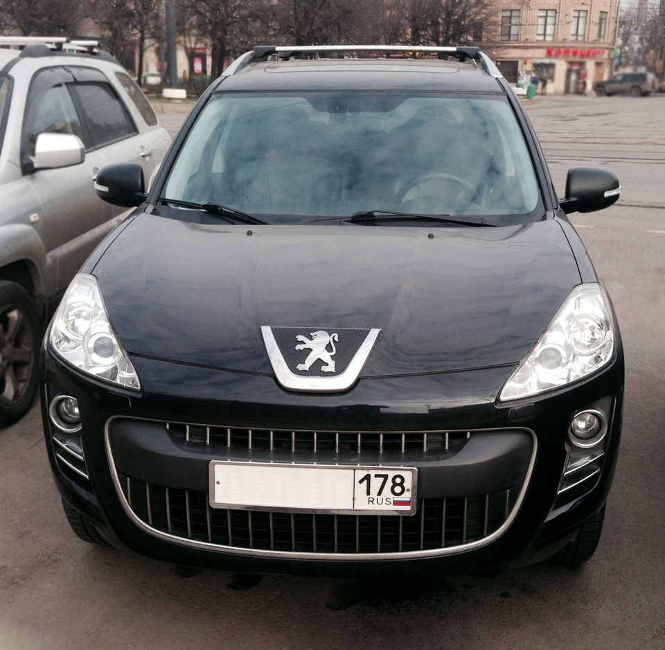 Значок Peugeot 4007