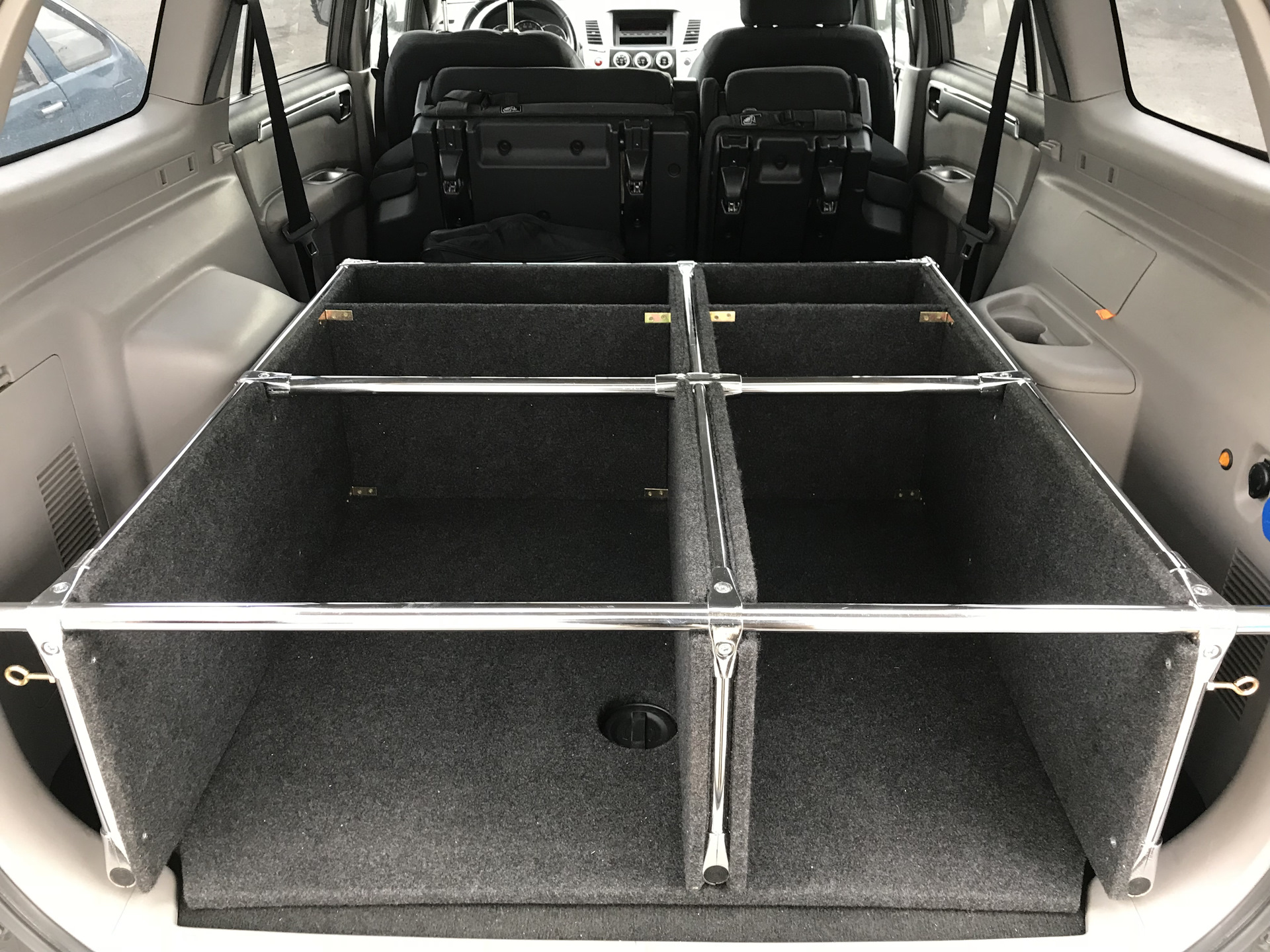 Спальник в прадо 120. Спальник органайзер прадо 120. Органайзер-спальник для тойота фортунер. Спальник органайзер в багажник. Органайзер для багажника шевроле экспресс.