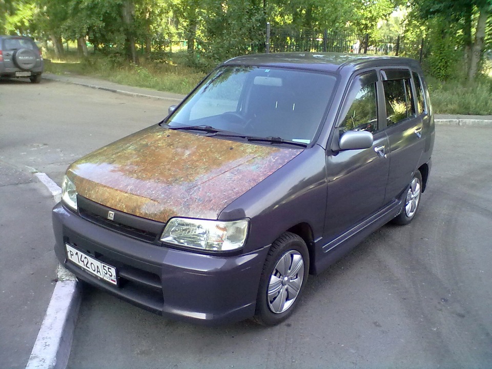 Ниссан куб az10. Nissan Cube 1999. Ниссан куб 1999 года. Ниссан куб черный 1999-2001. Ниссан Кьюб 1999.