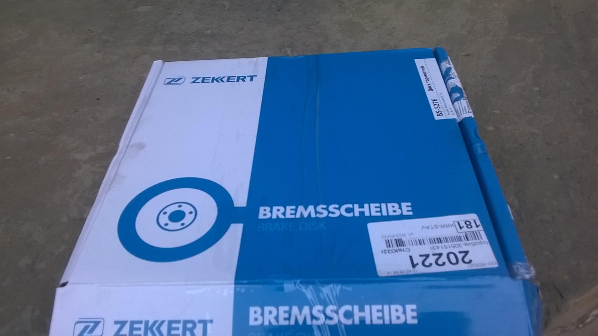 Производитель zekkert отзывы. Zekkert sp4129. Коробка Zekkert. Колодки Zekkert с датчиками. Тормозные диски SANGSIN или Zekkert.