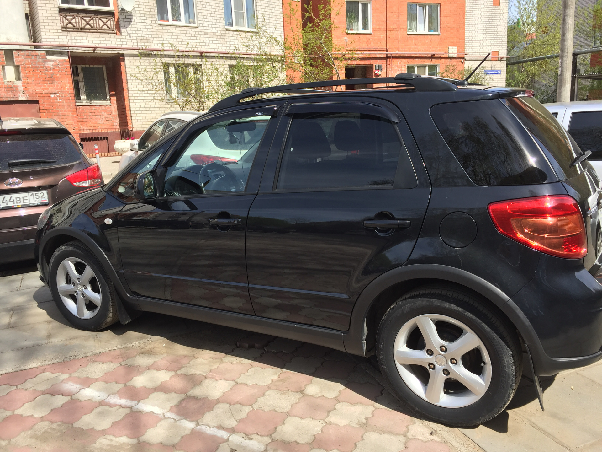 Дефлекторы окон — Suzuki SX4 (1G), 1,6 л, 2009 года | аксессуары | DRIVE2