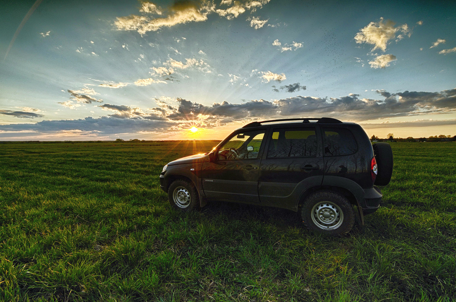 Нива шевроле песня. Нива Шевроле. Заниженная Нива Шевроле. Chevrolet Chevrolet Niva 1.7 глушь. Нива Шевроле для бездорожья.