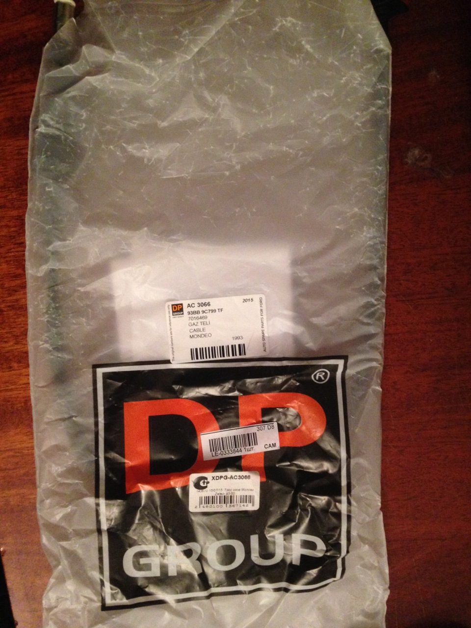Трос, купленный на Exist, он оказался короче, чем нужно — Ford Mondeo I. Запчасти на фото: AC3066, 93BB9C799TF