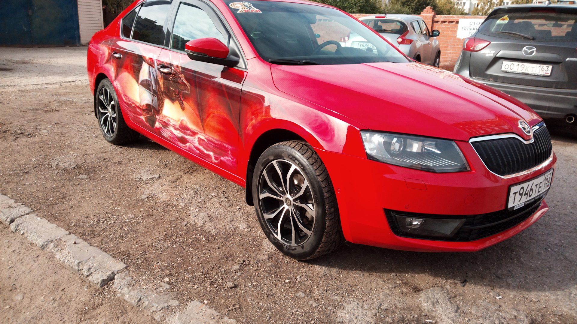 Octavia red. Skoda Octavia a7 красная. Шкода Октавия а7 красная. Винил на Шкода Октавия а7. Шкода актавия а7 красная.