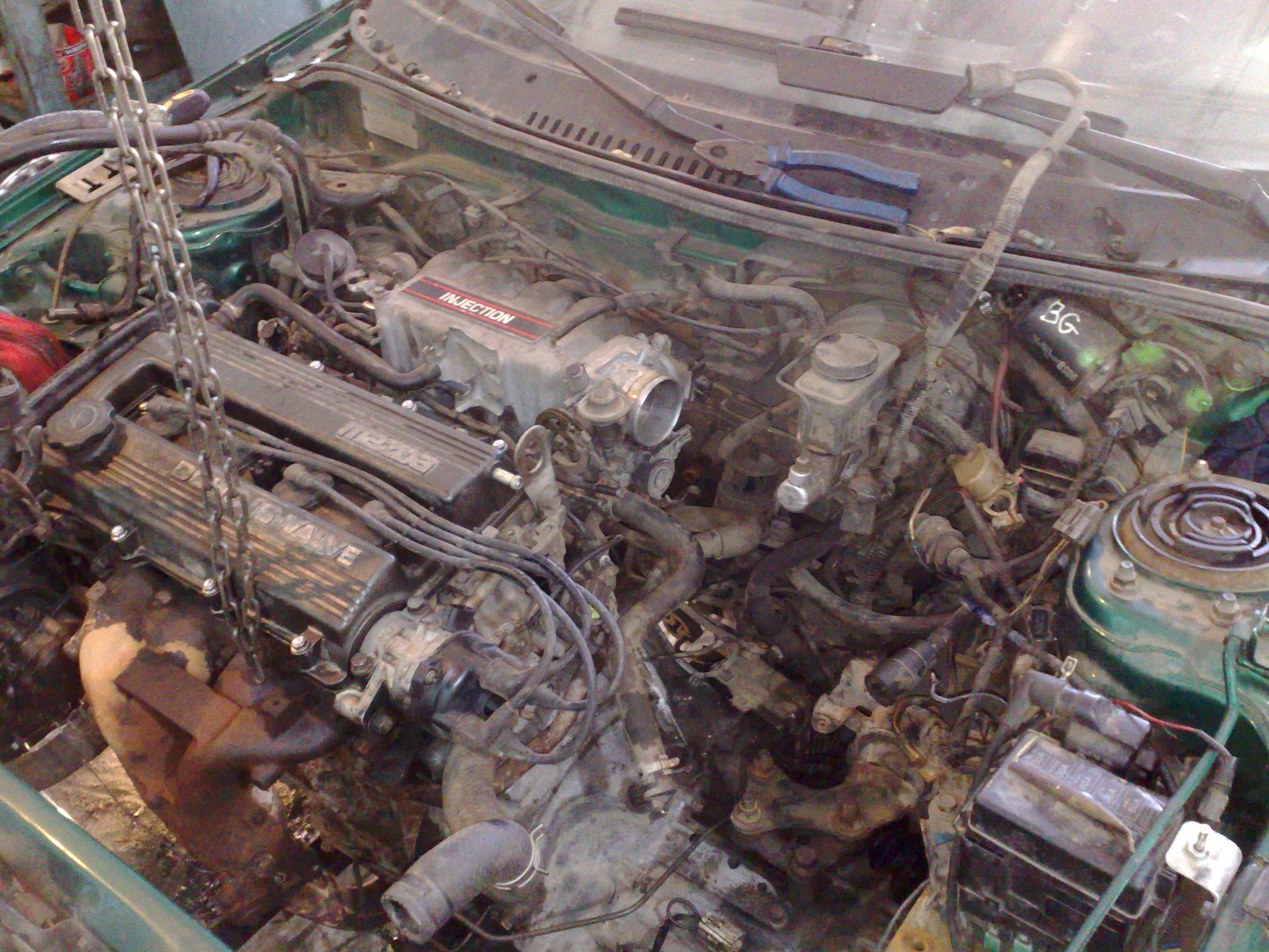 Замена двигателя mazda. ДВС Мазда 323. Двигатель Мазда 323 1.8. Мазда 323 1.7 дизель 1991 форсунки. Мазда 323f под капотом.