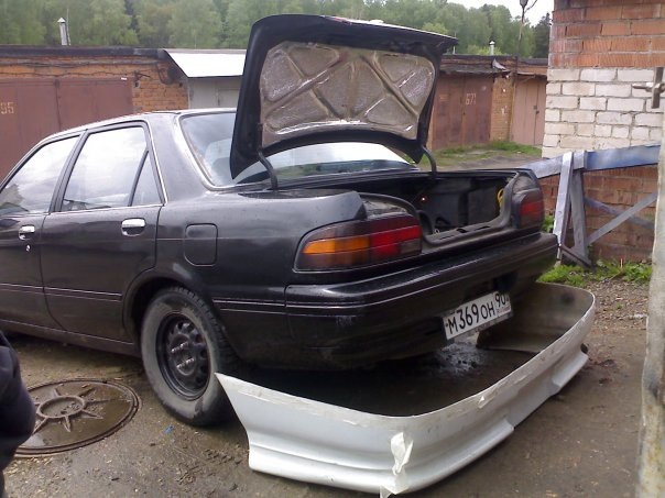 rear bumper - Toyota Carina 15 L 1990