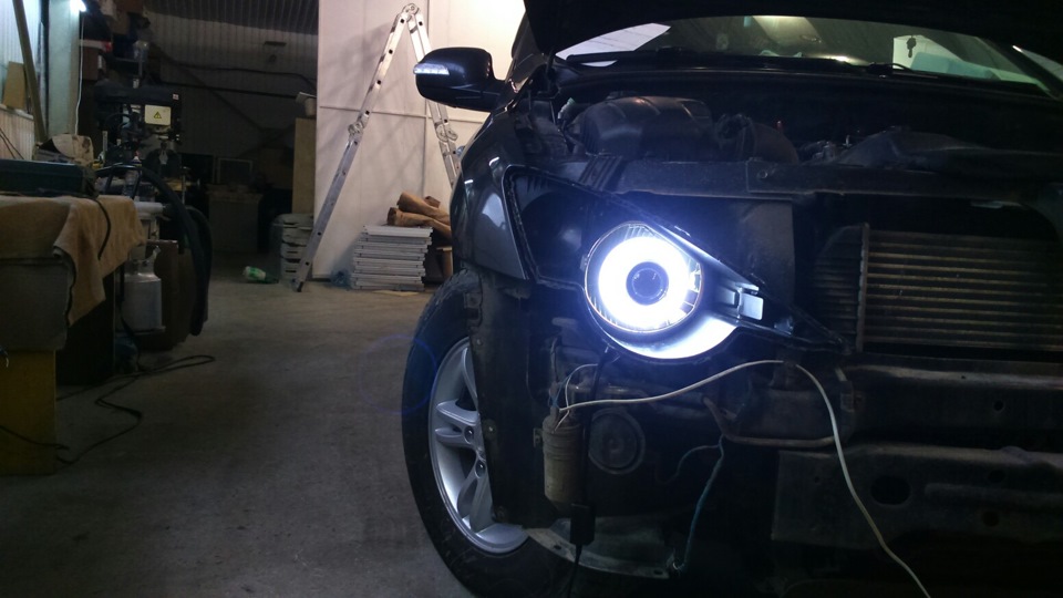 SsangYong Actyon Sports установка би-линз, автокорректора и омывателя ...