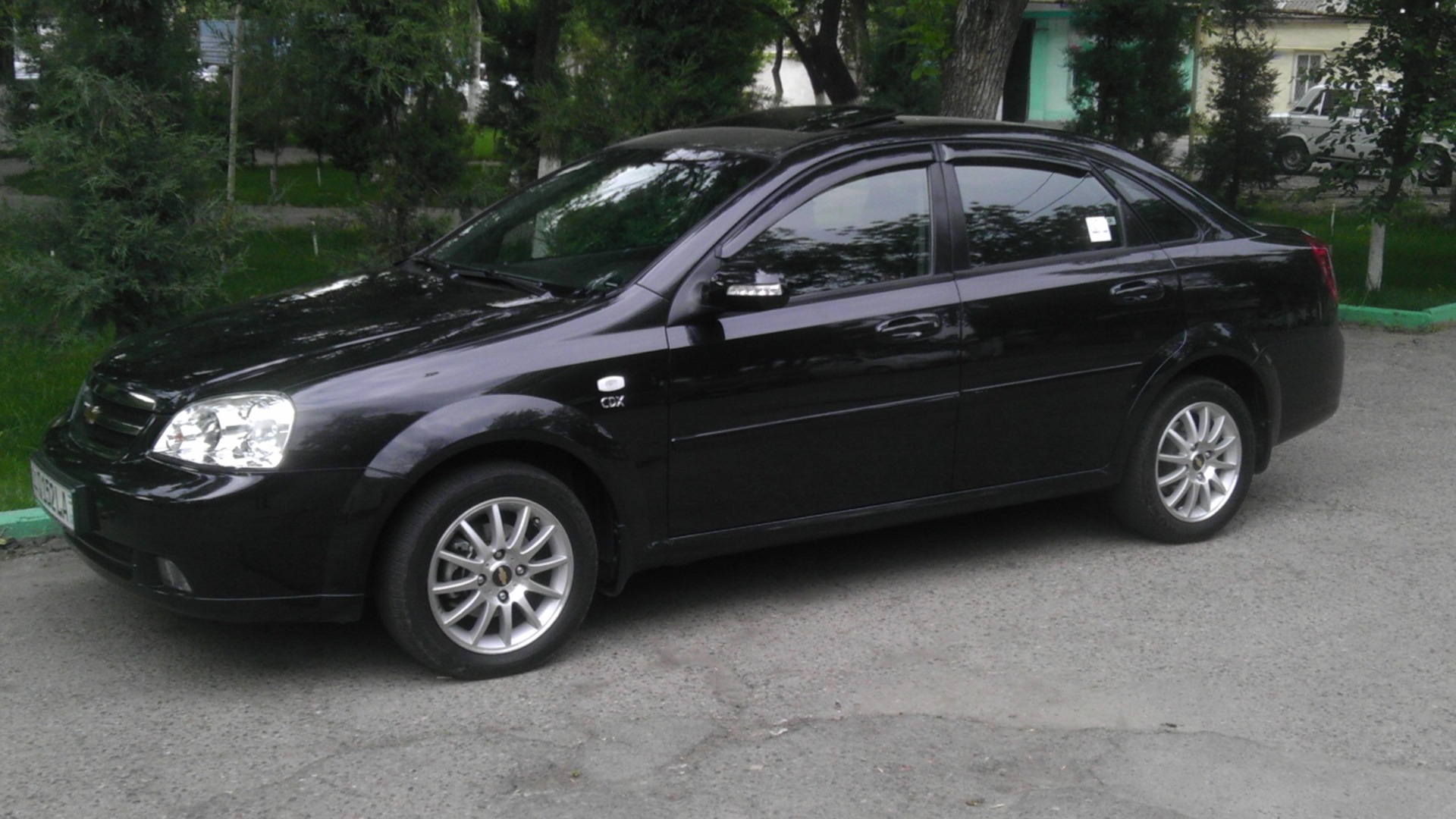 Лачетти седан акпп. Lacetti 1.8 Black. Лачетти седан черный. АКПП Лачетти. Шевроле Лачетти черный автомат.