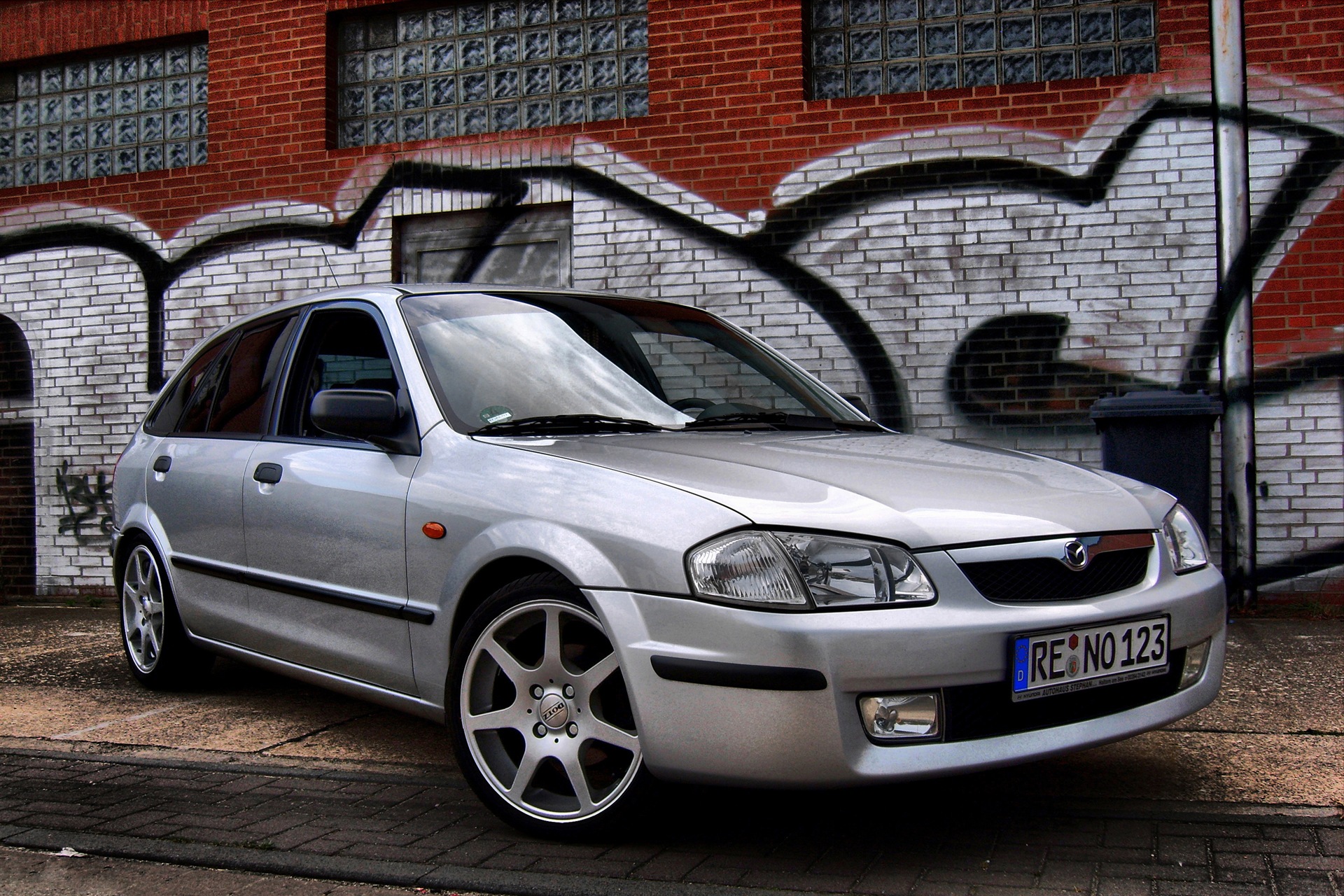 Mazda 323f bj. Mazda 323 bj тюнинг. Mazda 323 f bj стенс. Mazda 323 bj седан тюнинг. Обвес Мазда 323 bj.