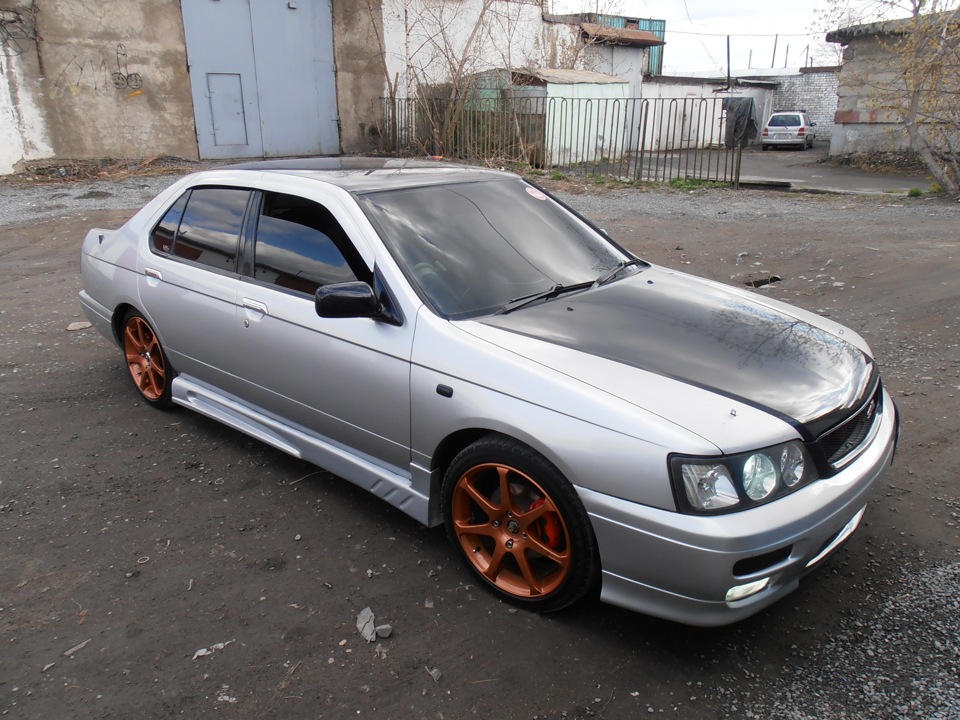 Nissan bluebird u14. Ниссан Блюберд 14. Nissan Bluebird u14 обвес. Nissan Bluebird 1998 обвес.