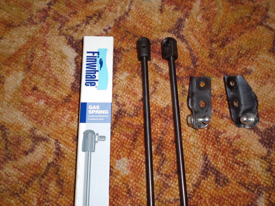 амортизатор багажника мазда фамилия bj5w. стойки пятой двери. амортизаторы для дверей автомобиля. стойка 5 двери каптюрномер. тигуан 20202 амортизатор задней двери электрический.