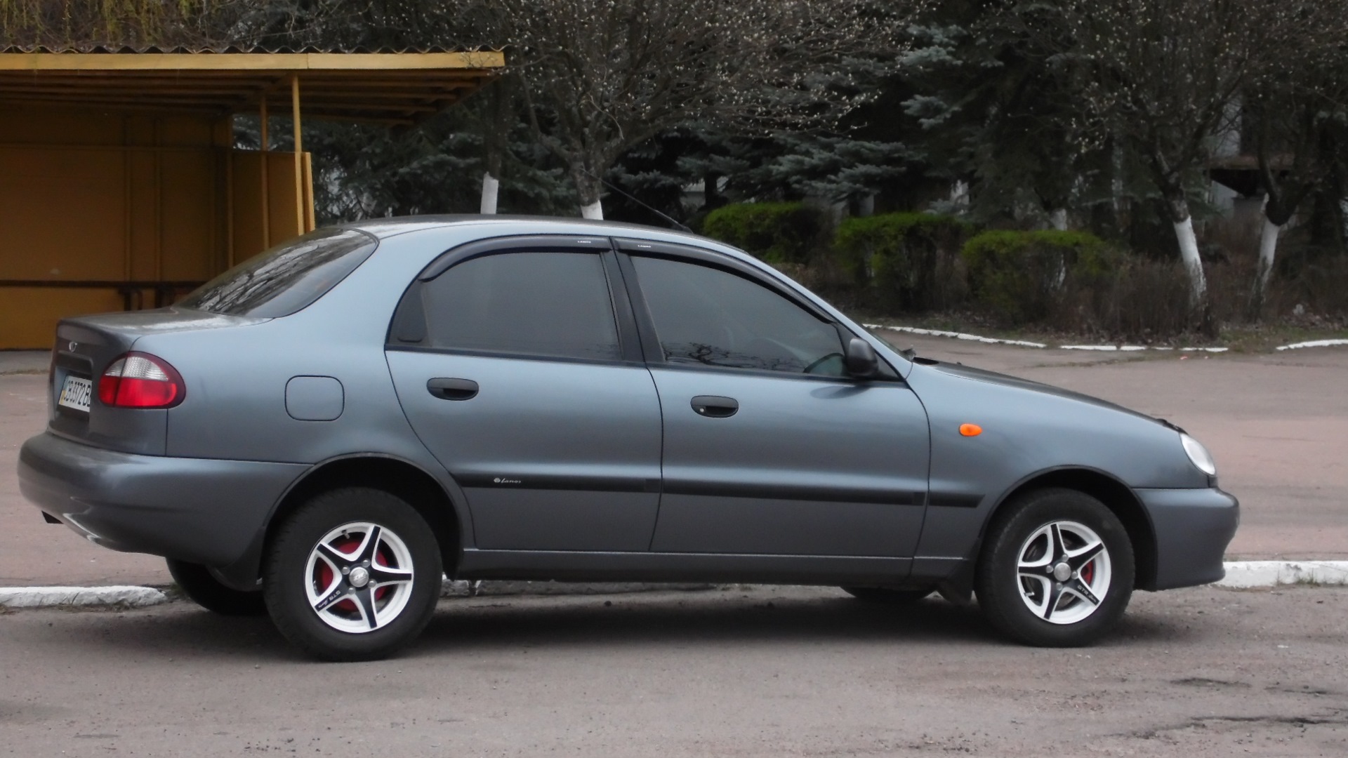 Серый ланос. Chevrolet lanos серый. ЗАЗ Ланос 1.5. Шевроле Ланос с черными порогами. Ланос кросс.