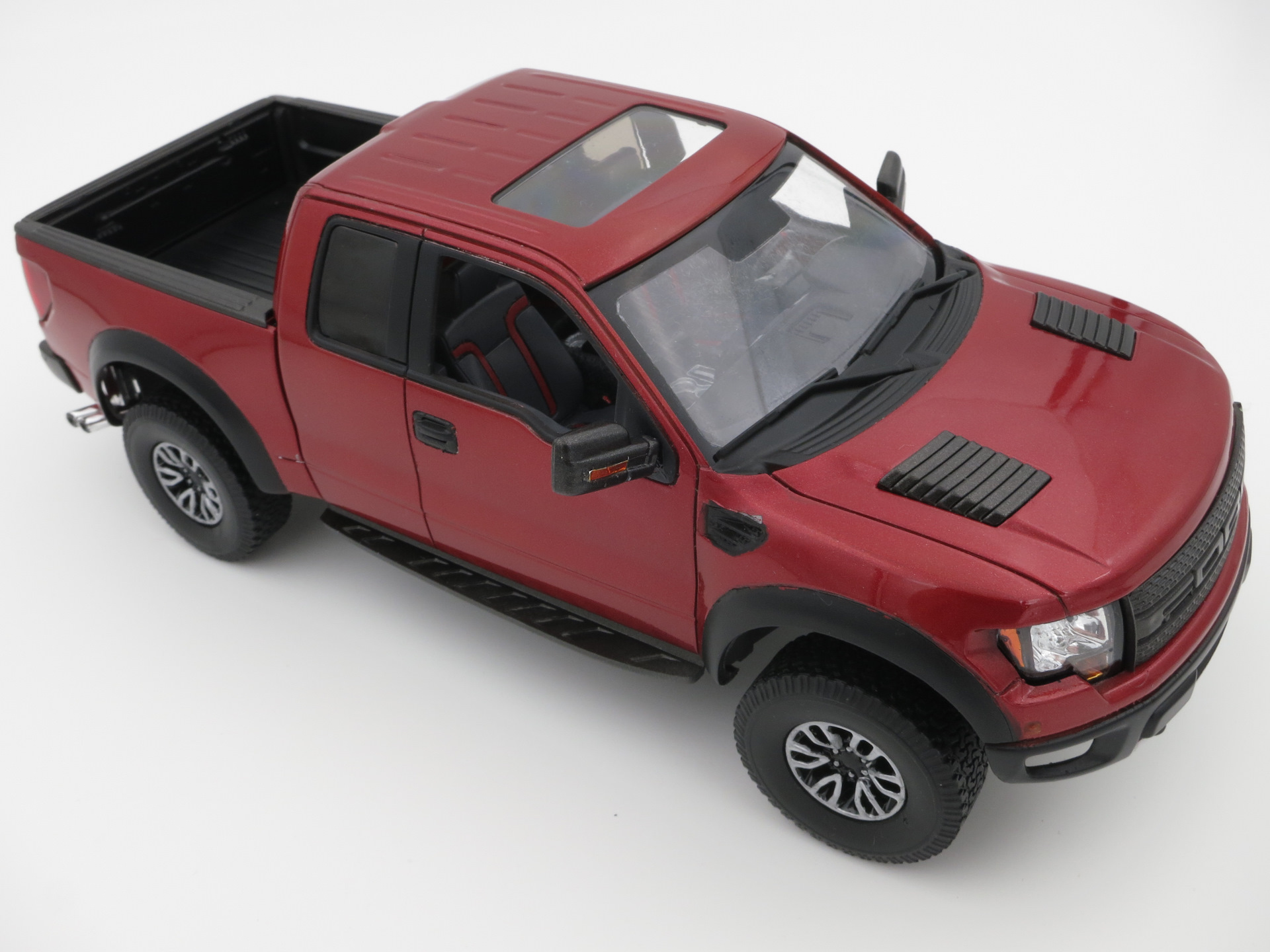 Модель масштаб 1 6. Ford f-150 SVT Raptor от Revell. Форд Раптор моделька. Revell набор Ford f-150 Raptor. F150 2002 моделька.
