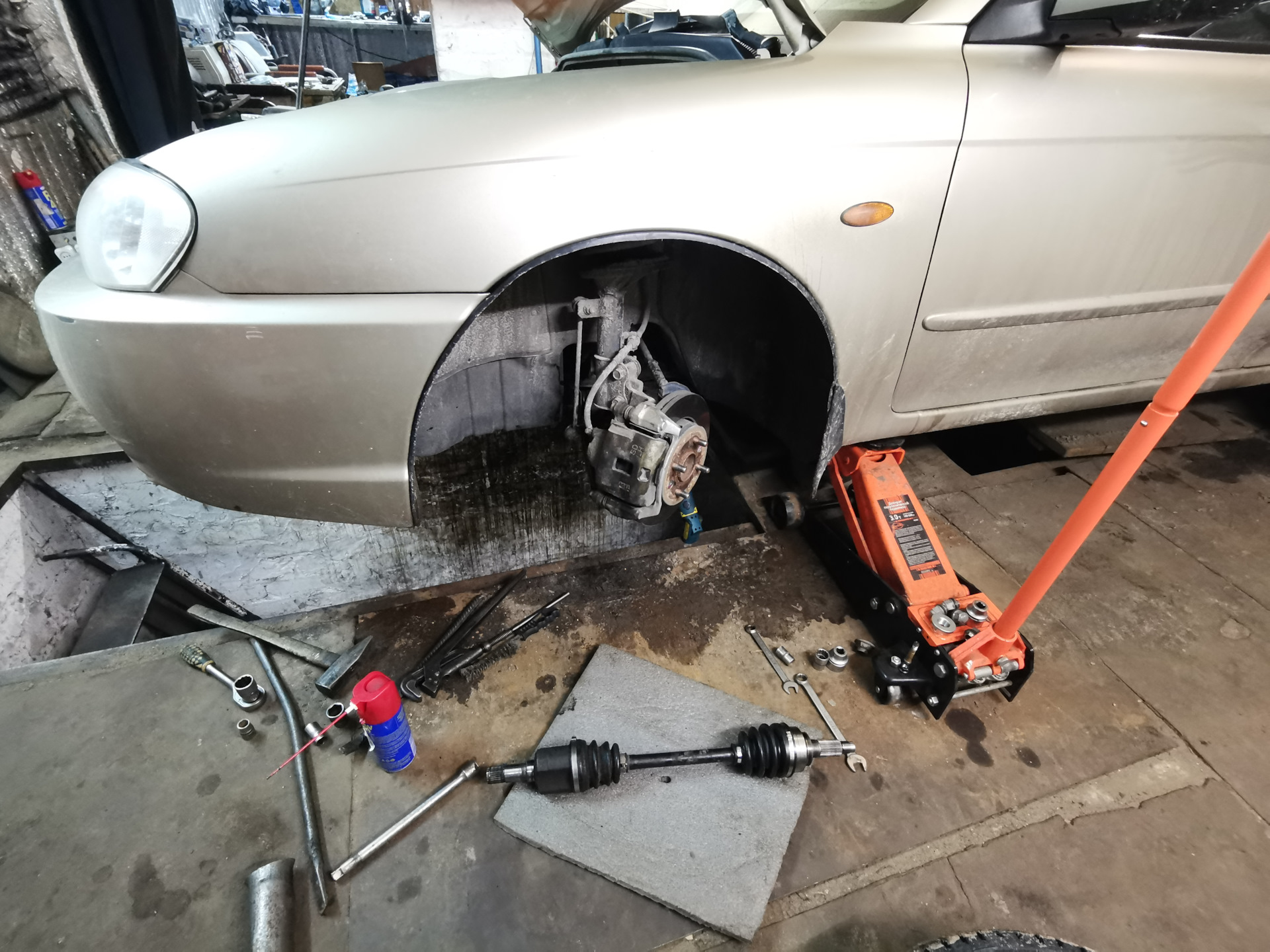 Замена левого наружного шруса HDK KI010 — KIA Spectra, 1,6 л, 2008 года ...